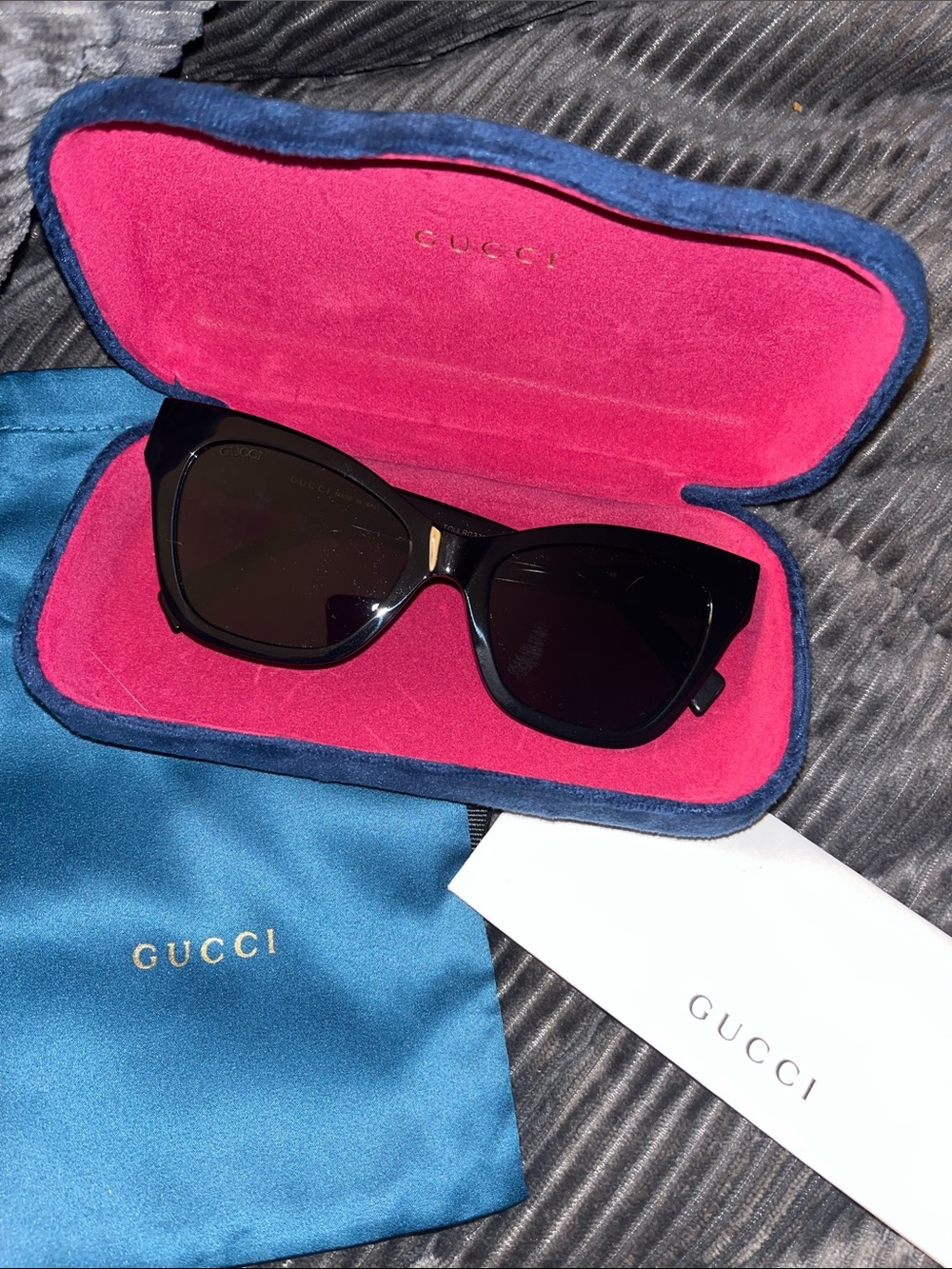 Gucci Women's Black Cat-Eye Sunglasses with Gold Accent